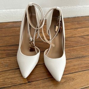White just fab 4 inches stilettos with gold key details